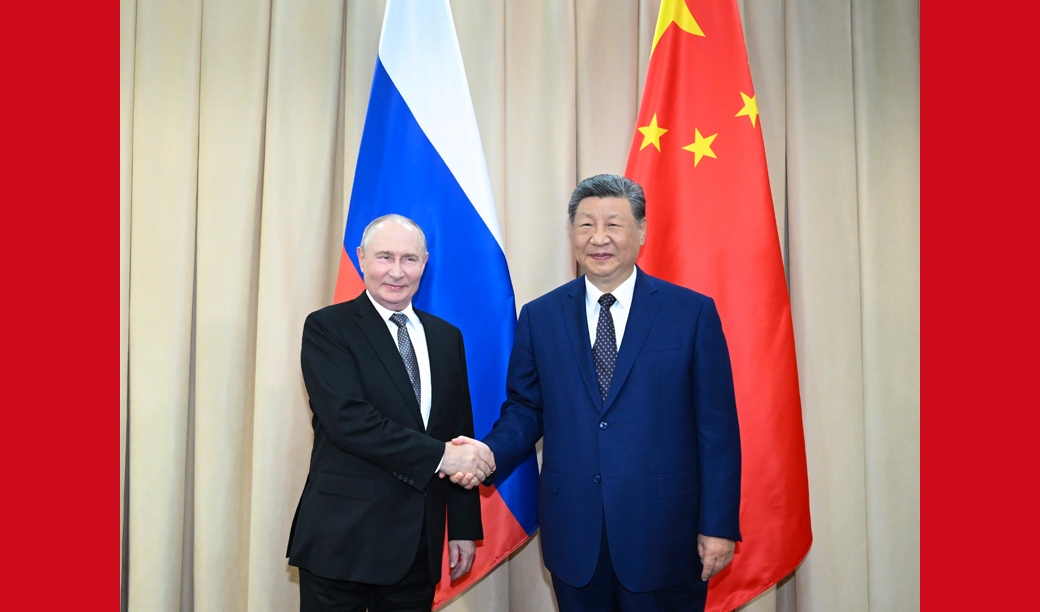 习近平会见俄罗斯总统普京
